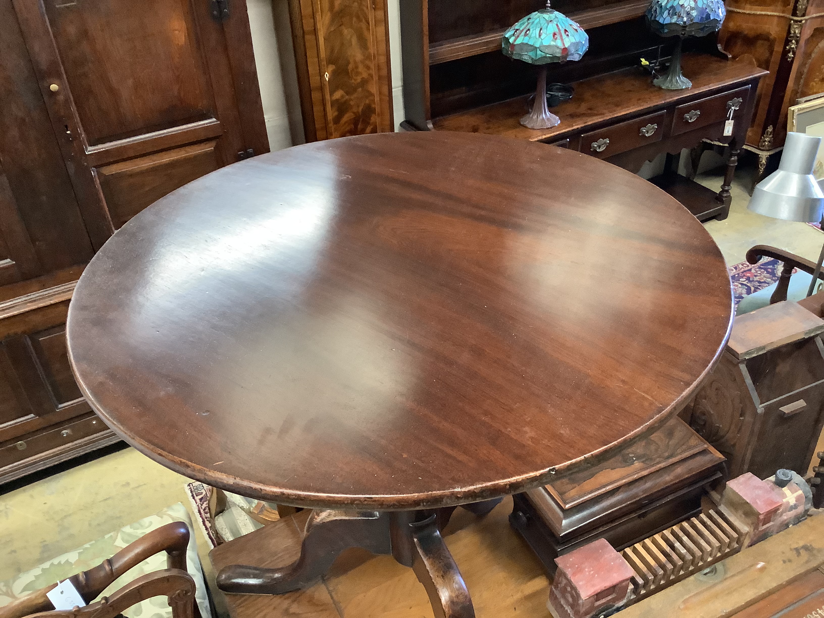 A George III and later circular mahogany tripod tea table, diameter 78cm, height 71cm